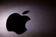 U.S. stocks erase gains after Apple hiring report causes company shares to dip